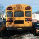 bus_squeezing_through_in_snow_tls