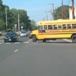 car passing school bus sunset
