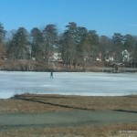 kid on frozen lake
